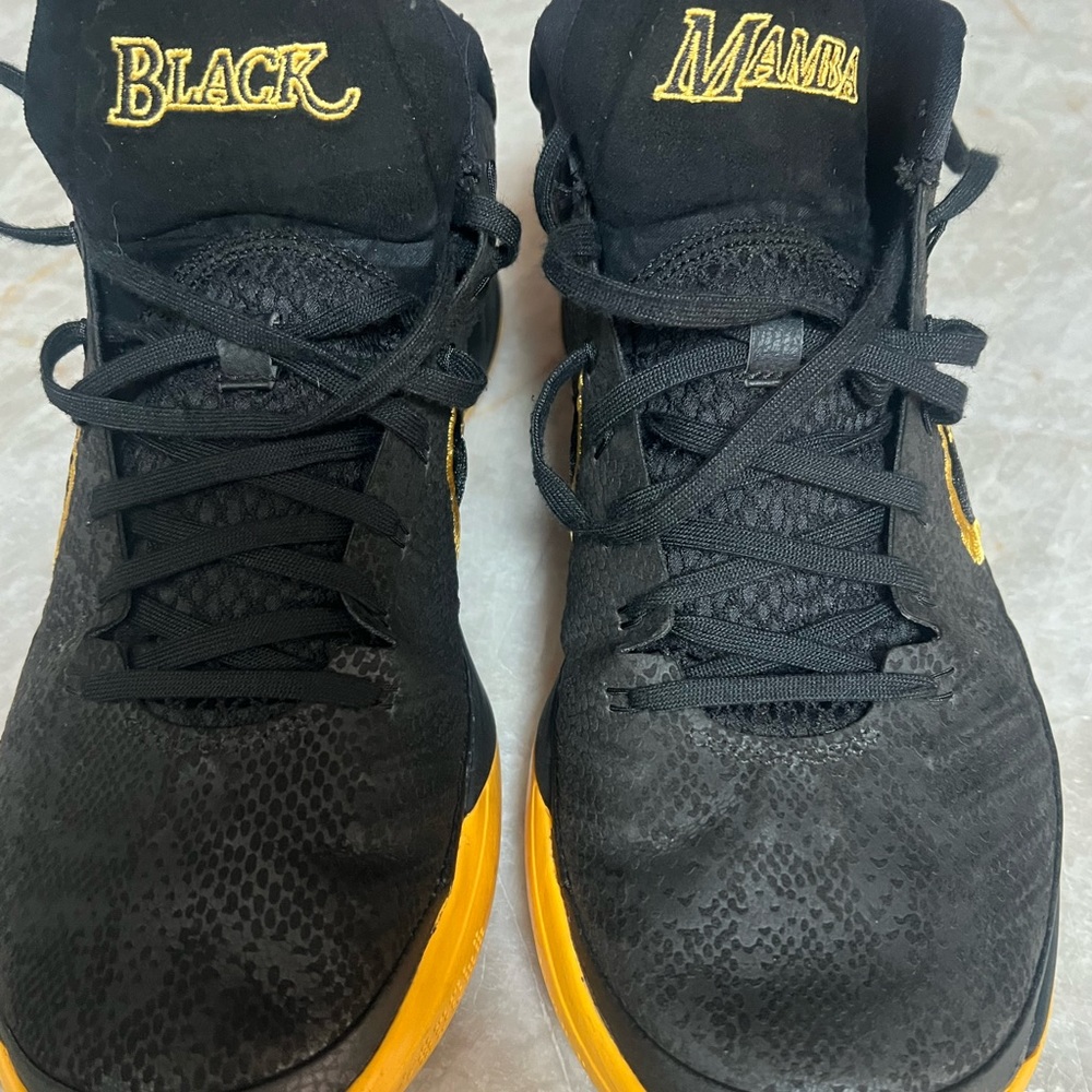 Nike Kobe Black Mamba athletic shoes.